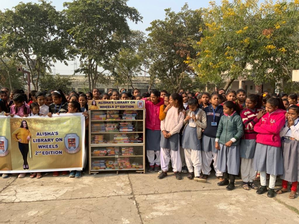 Students at this Indian orphanage celebrate the opening of a library supported by former Seven Lakes High student Alisha Madhuvarshi.